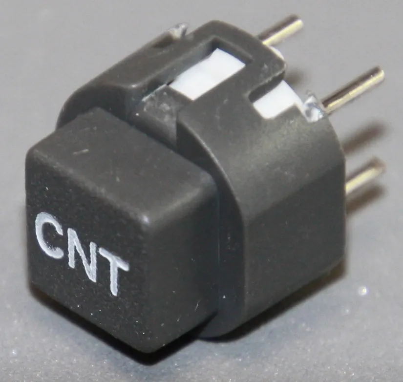 Tryktast med påskrift ""CNT""