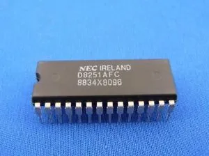 PROGRAMMABLE COMMUNICATIONS INTERFACE DIL28